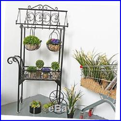 Large black metal freestanding scrollwork french trolley cart plant stand with 4
