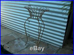 Vintage daisy shaped metal wire plant stand