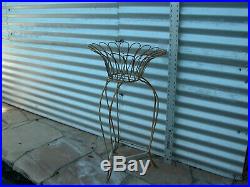Vintage daisy shaped metal wire plant stand